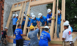 Habitat for Humany volunteers building house